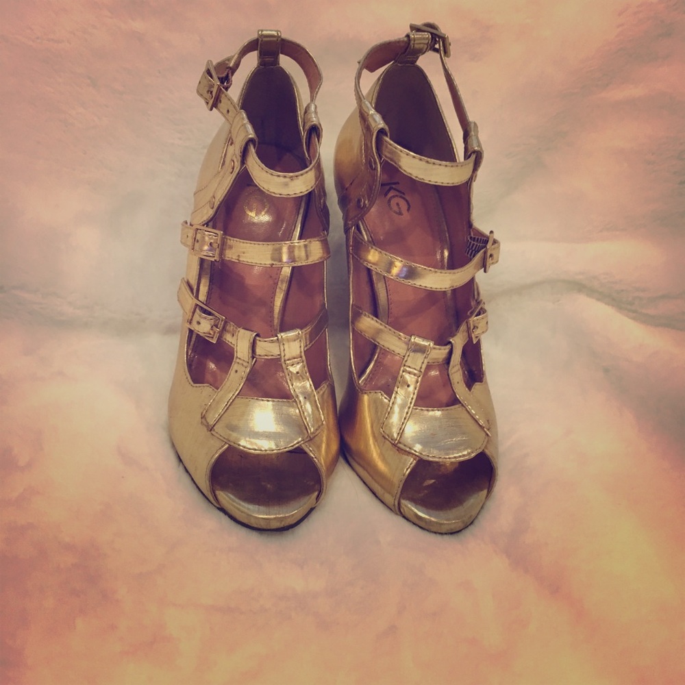Gold strappy heels by Kurt Geiger